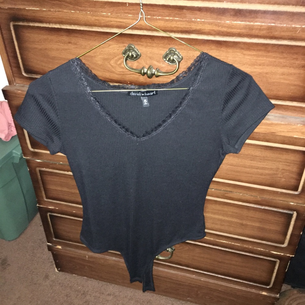 black thong bodysuit with lace on the chest area